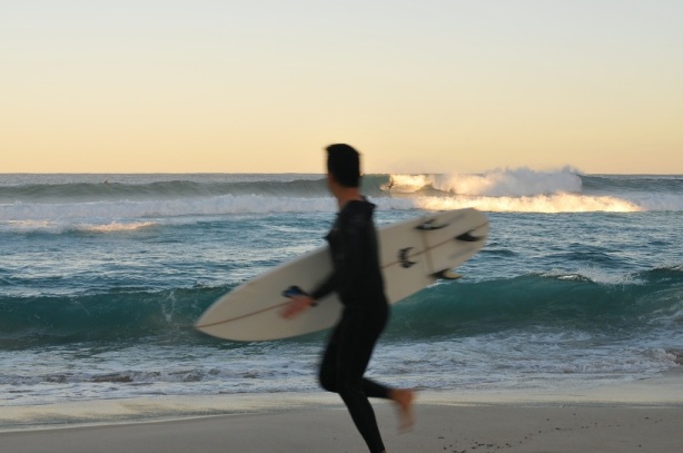 Surfer Looks On In Envy